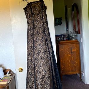 Strapless, full-length, lace dress.